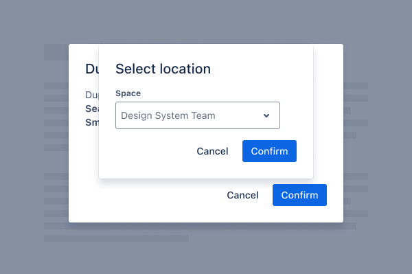 A second modal titled select location opens on top of another modal, hiding the content of the first modal. It contains a form field labeled space, a dropdown selection, and two buttons located at the bottom right of the modal: a secondary subtle cancel button and a primary blue confirm button. The same buttons can be seen in the modal underneath, so it is not clear which one to select.